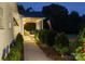 Well-maintained home exterior with a welcoming porch, decorative plants, and warm lighting at 796 Cornelius Rd, Mooresville, NC 28117