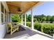 Inviting front porch with comfortable seating and a view of the landscaped front yard at 796 Cornelius Rd, Mooresville, NC 28117