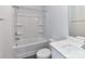 Bright white bathroom with a shower-tub combo and modern vanity at 1108 Piper Meadows Dr # 52, Waxhaw, NC 28173