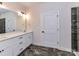 Bathroom featuring a double vanity with marble countertop and modern fixtures at 1108 Piper Meadows Dr # 52, Waxhaw, NC 28173