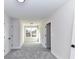 A bright bedroom with neutral walls, carpeted floors, and a window with natural light at 1108 Piper Meadows Dr # 52, Waxhaw, NC 28173