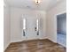 Welcoming foyer with hardwood flooring and ample natural light at 1108 Piper Meadows Dr # 52, Waxhaw, NC 28173