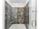 Modern tile shower with frameless glass enclosure and built-in seat at 1108 Piper Meadows Dr # 52, Waxhaw, NC 28173
