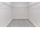 A large walk-in closet with carpeted floor and wire shelving at 1108 Piper Meadows Dr # 52, Waxhaw, NC 28173