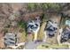 Aerial view of a home with well-defined property lines, outdoor patio, and lush landscaping at 2012 Tomshire Dr, Gastonia, NC 28056
