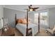 Comfortable bedroom featuring a four-poster bed and lots of natural light at 2012 Tomshire Dr, Gastonia, NC 28056