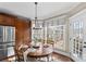 Cozy dining area with hardwood floors, pendant lighting, and bright windows at 2012 Tomshire Dr, Gastonia, NC 28056