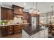 Elegant kitchen features granite counters, custom cabinets, and stainless steel appliances at 2012 Tomshire Dr, Gastonia, NC 28056