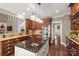 Spacious kitchen featuring stainless steel appliances, granite counters, and a central island with a sink at 2012 Tomshire Dr, Gastonia, NC 28056