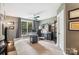 Bright home office with a large window, neutral carpet, and functional built-in storage at 2012 Tomshire Dr, Gastonia, NC 28056