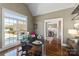 Home office featuring hardwood floors, a glass-top desk, a cathedral ceiling and great natural light at 2012 Tomshire Dr, Gastonia, NC 28056