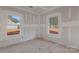 Unfinished bedroom with large window at 6172 Lowder Rd, Salisbury, NC 28147