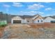 New construction home exterior with attached garage at 6172 Lowder Rd, Salisbury, NC 28147