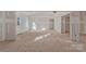 Large living room with vaulted ceiling and unfinished walls at 6172 Lowder Rd, Salisbury, NC 28147