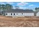 Unfinished house exterior with exposed framing and siding at 6172 Lowder Rd, Salisbury, NC 28147