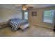 Large bedroom with a king-size bed and ceiling fan at 1148 Mckee Farm Ln, Belmont, NC 28012