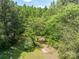 Aerial view showing a wooded lot at 1571 Branchville Rd, Shelby, NC 28150