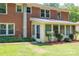 Brick house with sunroom and a nicely landscaped yard at 1571 Branchville Rd, Shelby, NC 28150