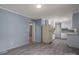 Kitchen with white cabinets, gray countertops, and modern appliances at 1571 Branchville Rd, Shelby, NC 28150