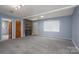 Living area with fireplace and access to other rooms at 1571 Branchville Rd, Shelby, NC 28150