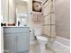Well-lit bathroom featuring a shower-tub combo and modern vanity at 2025 Belmont Terraces Ln # 7, Charlotte, NC 28205