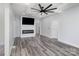 Modern living room featuring hardwood floors and fireplace at 423 W Bell St, Statesville, NC 28677