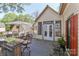 Covered porch with patio furniture perfect for outdoor dining and relaxation at 235 Walnut St, Statesville, NC 28677