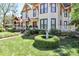 Well-maintained front yard highlighting the lush lawn and manicured shrubbery at 235 Walnut St, Statesville, NC 28677