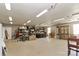 A spacious garage interior with ample storage and a workbench area at 235 Walnut St, Statesville, NC 28677