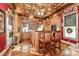 Spacious kitchen with custom wood cabinets, granite countertops, and stainless steel appliances at 235 Walnut St, Statesville, NC 28677