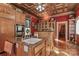 Well-equipped kitchen with granite countertops, gas cooktop, custom cabinets and stainless appliances at 235 Walnut St, Statesville, NC 28677