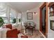 Cozy sunroom featuring plenty of natural light with comfortable seating area at 235 Walnut St, Statesville, NC 28677