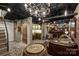 Finished basement with wine cellar, bar, and seating area at 215 N Main St, Belmont, NC 28012