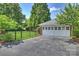 Spacious three-car garage with white doors at 215 N Main St, Belmont, NC 28012