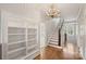 Elegant hallway with built-in shelving and hardwood floors at 215 N Main St, Belmont, NC 28012