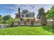 Elegant brick home with manicured lawn at 215 N Main St, Belmont, NC 28012