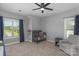 bedroom with crib, armchair and window views at 4212 Linville Way, Fort Mill, SC 29707