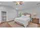 Main bedroom with vaulted ceiling, hardwood floors, and en-suite bathroom at 4212 Linville Way, Fort Mill, SC 29707