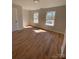 This bedroom has wood floor and windows at 814 W Raleigh W Ave, Statesville, NC 28677