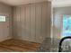 Dining space featuring modern wainscoting and new hard wood flooring at 814 W Raleigh W Ave, Statesville, NC 28677