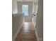 Second floor hallway with luxury vinyl plank flooring and natural light at 814 W Raleigh W Ave, Statesville, NC 28677