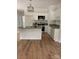 New kitchen with granite countertops, stainless steel appliances, and white cabinets at 814 W Raleigh W Ave, Statesville, NC 28677