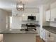 Modern kitchen with granite countertops, stainless steel appliances, and a stylish island sink at 814 W Raleigh W Ave, Statesville, NC 28677