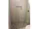 Close up on shower with tiled walls and decorative tile floor at 814 W Raleigh W Ave, Statesville, NC 28677