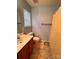 Full bathroom showcasing a light colored shower curtain and vanity sink at 10875 Holly Ridge Blvd, Charlotte, NC 28216