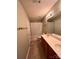 This bathroom has a double sink vanity, shower and tub combination at 10875 Holly Ridge Blvd, Charlotte, NC 28216