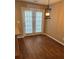 Dining area with french door and laminate floors at 10875 Holly Ridge Blvd, Charlotte, NC 28216