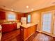Bright kitchen with appliances, wood cabinets and island at 10875 Holly Ridge Blvd, Charlotte, NC 28216