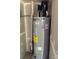 Water heater with plumbing in an unfinished room at 10875 Holly Ridge Blvd, Charlotte, NC 28216