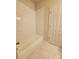 Bathroom featuring a white tub with subway tile and marble flooring at 2668 Meadow St, Gastonia, NC 28056